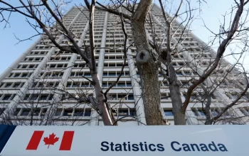 Statistical charts on computer screen representing national data analysis